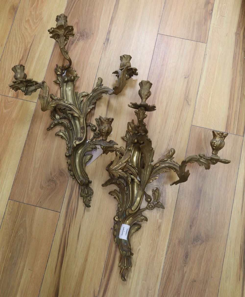 A pair of ormolu scrolled leaf wall sconces, height 54cm